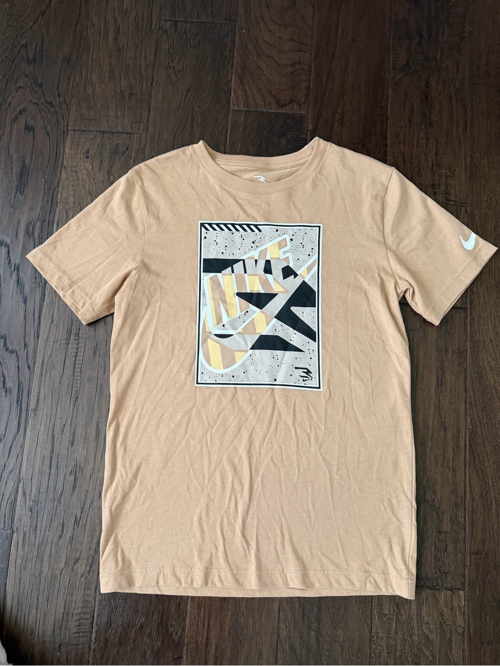 New Nike Beige Graphic Short Sleeve Kids Tee with Multicolor Chest Print